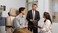 cancer care provider with patient